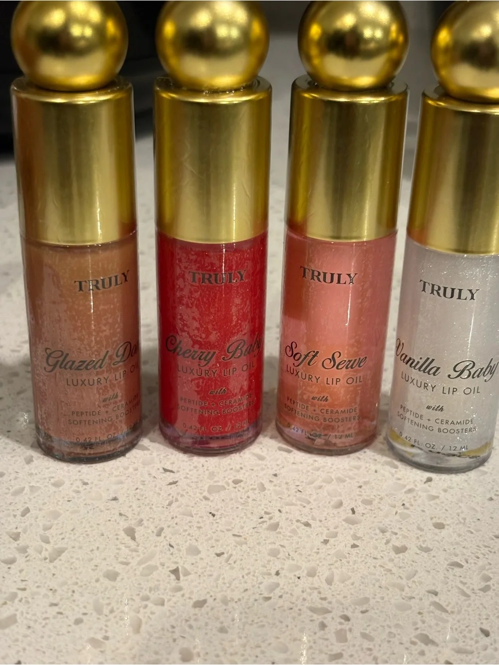 TRULY Lip Oil - vanilla baby, soft serve, cherry baby ,Glazed donut pick 1
